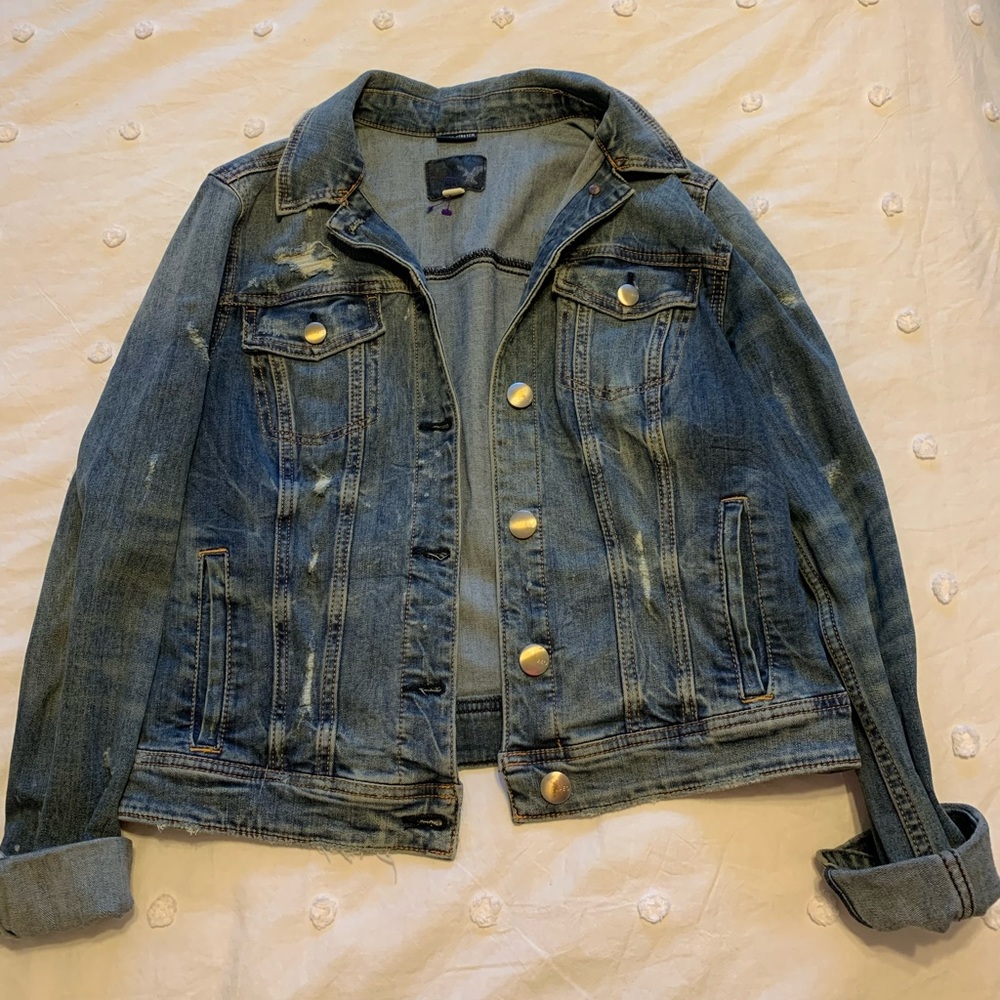 Distressed denim jacket